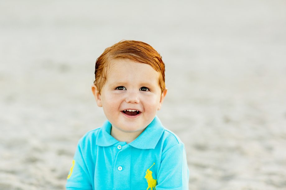 smiling boy at the beach